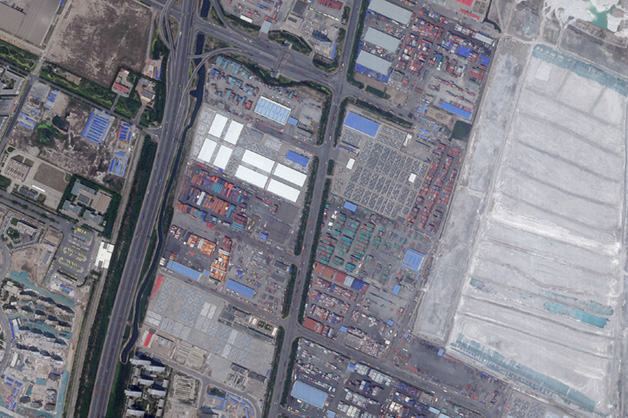 white buildings on warehouse grounds